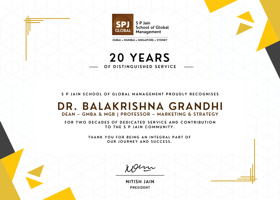 Signed SP Jain recognition graphic thanking Dr. Balakrishna Grandhi for 20 years of distinguished service